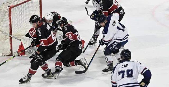 photo  marius serer, au centre (n° 14) dans le slot adverse.  &copy;  sébastien aubinaud 