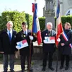 photo  le commandant daniel thuault, roger louisfert et christian beauvalon, porte-drapeaux honorés et sylvie poirier, maire de l’orée d’écouves, lors de la remise d’insignes aux porte-drapeaux. 
