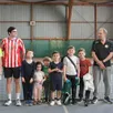 photo  sourires au club de tennis, notamment pour l’entraîneur arnaud bouanich (à droite). 