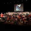 photo la répétition a rassemblé les cent choristes et soixante musiciens, sur la scène du forum de flers, pour les derniers ajustements.