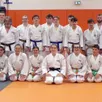 photo  une partie des judokas du semj qui ont participé à l’obtention de la ceinture noire de camille duval. 