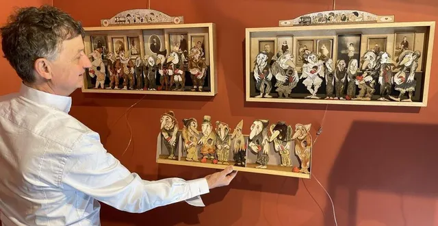 photo  eric dos santos devant des œuvres de bernard briantais, artiste qui participera au mur des enfants.  &copy;  le maine libre 