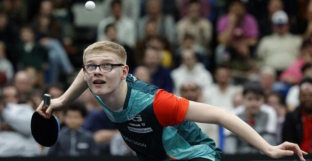 photo felix lebrun au service lors de la finale des championnats de france de tennis de table. © geoffroy van der hasselt / afp