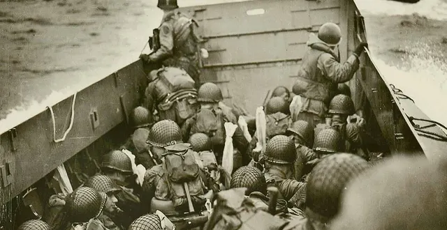 photo  le 6 juin 1944 à l’aube (ici, des soldats américains prêts à partir à l’assaut d’omaha beach), avec le débarquement allié en normandie, était lancée l’opération overlord, destinée à libérer l’ouest de l’europe du joug nazi. (photo retouchée avec un filtre)  &copy;  us national archives 