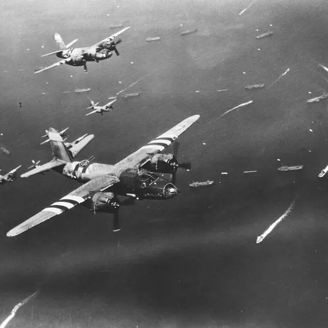 photo des bombardiers martin b-26, survolant la flotte d’invasion alliée.  ©  us national archives