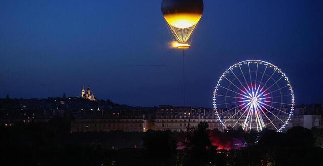photo la vasque olympique a fait son retour dans le ciel parisien ce 21 juin au soir. © stéphane geufroi / ouest-france