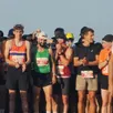 photo quelques instants avant le départ des 10 km des foulées gouletaises. au premier plan, l’animateur-chronométreur de smil’events.
