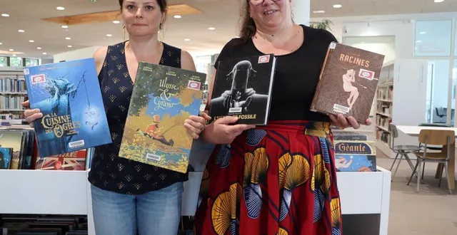 photo  les bibliothécaires alexia jorez et marie rolland présentent une partie de bd en lice.  &copy;  ouest-france 