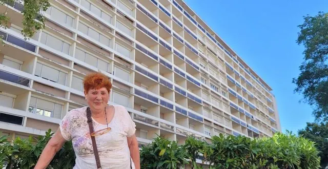photo  derrière daniele bouché, résidente de l’îlot savary, tous les volets de l’immeuble sont fermés pour garder un peu de fraîcheur.  &copy;  ouest-france 