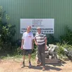 photo  christophe thoreton et noël thomas devant le hangar de la société de maçonnerie, à argentan, lundi 30 juin. 