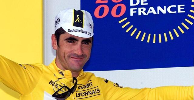 photo laurent jalabert porte le maillot jaune pour la dernière fois de sa carrière à vitré, lors du tour de france 2000. © pascal george / afp