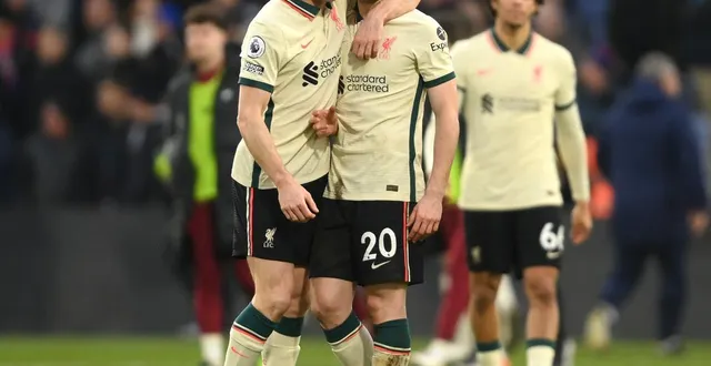 photo james milner et diogo jota le 23 janvier 2022. © mike hewitt / afp