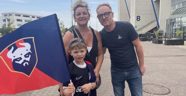 photo  virginia et john font un tour obligatoire par la boutique du stade malherbe pour acheter à maelyan un nouveau drapeau pour la saison.  &copy;  ouest-france 