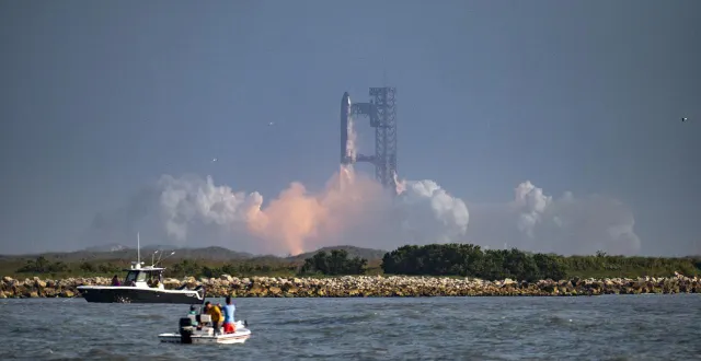 photo  la fusée spacex starship décolle de starbase, au texas, vue depuis south padre island, le 27 mai 2025. ?  &copy;  sergio flores/afp 
