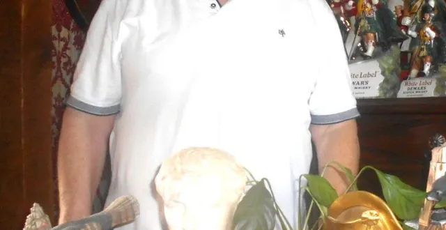 photo  jacques corvaisier devant une infime partie de ses collections.  &copy;  ouest-france 