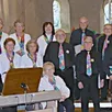 photo la chorale arc-en-ciel lors d’un concert dans l’église d’allonnes en 2024.