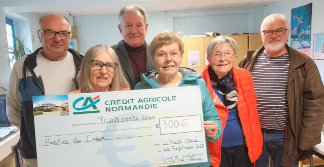 photo  lors de la remise du chèque, à partir de la gauche : didier bonhommet, responsable adjoint ; anna haumaitre, responsable locale des restos du cœur ; peter bosznay, responsable ornais des restos du cœur ; marie-france villette, présidente du jumelage avec neustadt ; thérèse charton, secrétaire, et claude villette, membre du jumelage.  &copy;  ouest-france 