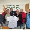 photo  l’équipe organisatrice du 39e semi-marathon d’argentan (orne) : le président laurent truillet (3e à gauche). 
