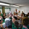 photo la grande joie des joueurs et des membres du club de laigné-saint-gervais (d2), dans le vestiaire après la victoire aux tirs au but en coupe de france.