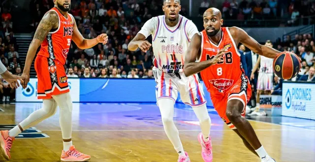 photo  le msb de johnny berhanemeskel a de nouveau pris le dessus sur le paris basketball.  &copy;  photo le maine libre - yvon loué 