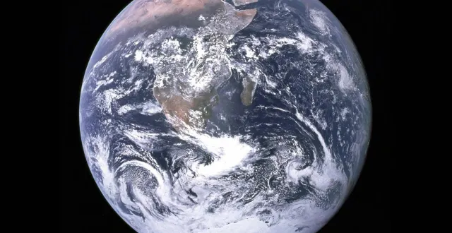 A view of earth from space, highlighting differing solar radiation levels.