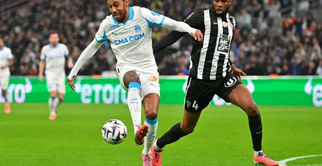 photo  pierre-emerick aubameyang et ousmane camara se retrouveront mi-janvier.  &copy;  afp 