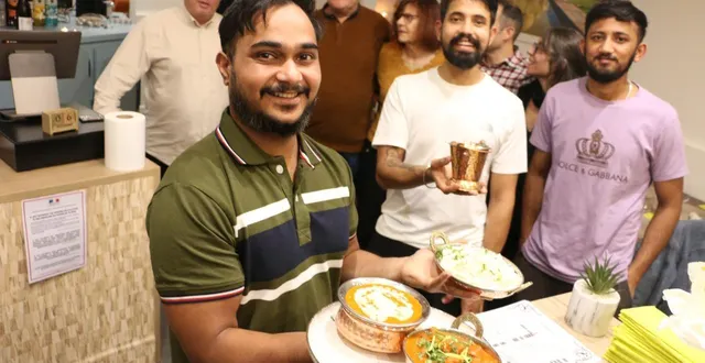 photo  jeudi 6 novembre 2025, au restaurant mr tandoori, avenue olivier-heuzé, au mans. gurdeep singh est entouré d’une partie des proches qui l’ont aidé.  &copy;  ouest-france 