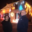 photo  sandra et stéphane jacquet devant leur belle maison illuminée. 