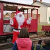 photo le père noël fera son grand retour à la gare de la roche.