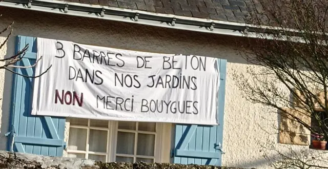 photo  l'une des banderoles affichées dans le quartier de trélazé en opposition au projet de bouygues immobilier.  &copy;  co 