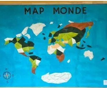 photo  la map monde réalisée par les élèves servira à afficher les photos de leurs voyages.  &copy;  le maine libre 