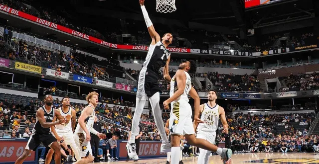 photo  victor wembanyama a fait son retour sur le terrain avec les spurs, samedi 13 décembre.  &copy;  ron hoskins / getty images via afp 