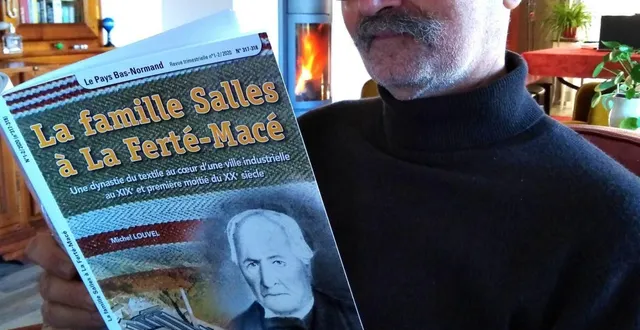 photo  michel louvel avec une de ses œuvres sur l’histoire de la ferté-macé.  &copy;  ouest-france 