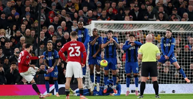 photo  bruno fernandes au moment de son coup franc magnifique.  &copy;  stu forster / afp 