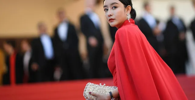 photo  he chengxi, sosie de l’actrice chinoise fan bing bing, participe au 71e festival de cannes, le 17 mai 2018.  &copy;  afp/loic venance 