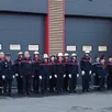photo  les sapeurs pompiers devant la nouvelle caserne. 
