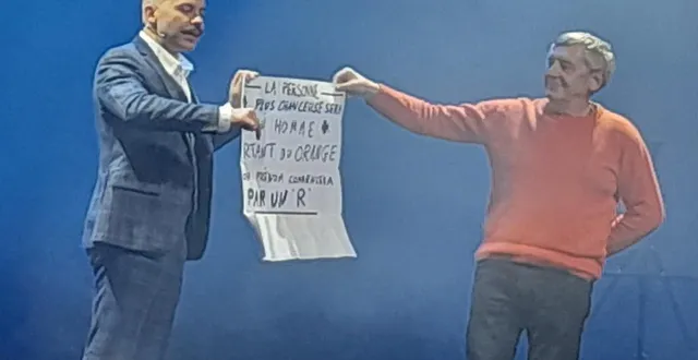 photo  viktor vincent (à gauche) a deviné un nombre choisi par richard au jeu de fléchettes sur une grille offrant 900 possibilités.  &copy;  co 