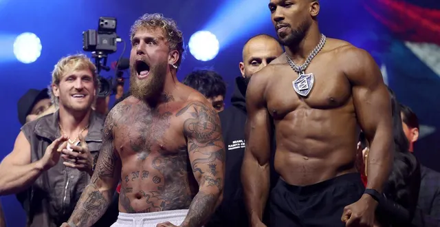 photo  jake paul et anthony joshua à la pesée.  &copy;  leonardo fernandez / getty images via afp 