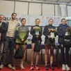 photo les meilleures féminines entourées des élus et organisateurs à l’heure de la remise des prix.