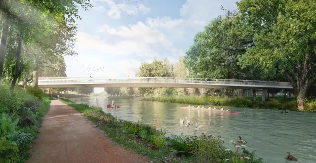 photo  la passerelle, accessible depuis le boulevard nature rive droite (à gauche sur l’image), devait enjamber la sarthe sur 60 mètres et être prolongée par une estacade de 250 mètres dans une zone humide et boisée, rive gauche (à droite sur l’image).  &copy;  agence aei – lalu – arcadis – noctiluca 