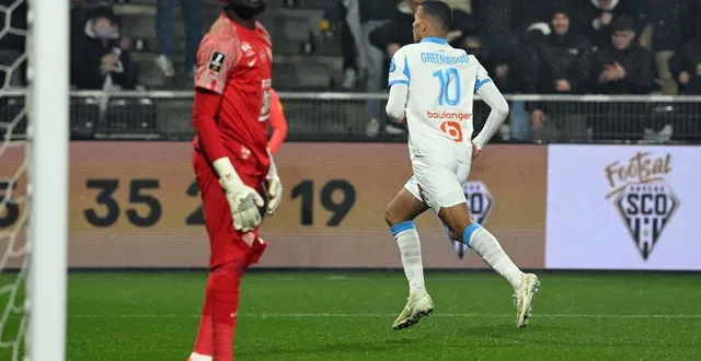 photo  greenwood célèbre le 2e but de l’om, devant un koffi impuissant.  &copy;  afp 