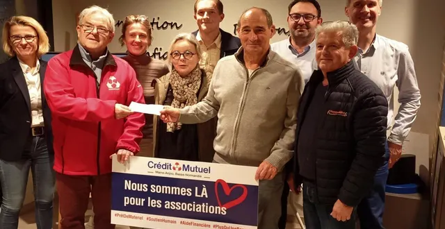 photo  l’association sla a remis un chèque de 673 €.  &copy;  le maine libre 