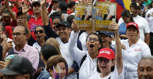 photo  des manifestants défilent en soutien au président vénézuélien nicolás maduro, et demandent sa libération, à caracas le 22 janvier 2026.  &copy;  afp 