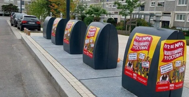 photo  des affiches du npa ont été collées sur des points d’apport volontaires.  &copy;  co 