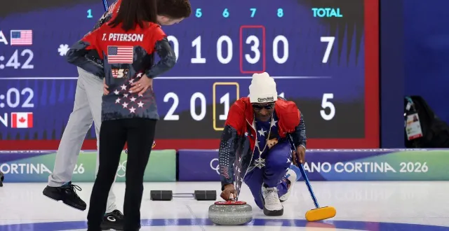 photo  snoop dogg se tente au curling.  &copy;  getty images via afp 