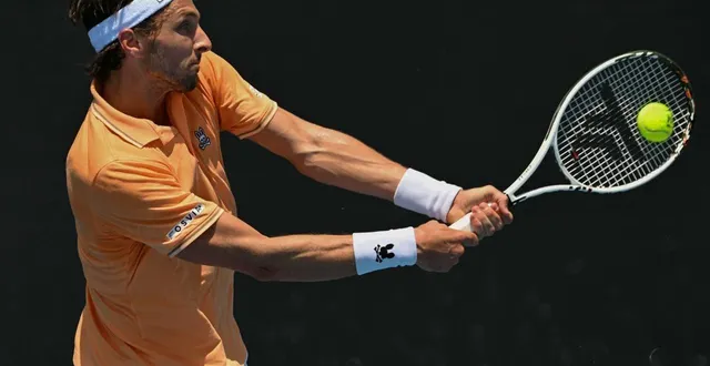 photo  arthur rinderknech a permis à la france d’égaliser contre la slovaquie en coupe davis.  &copy;  afp 