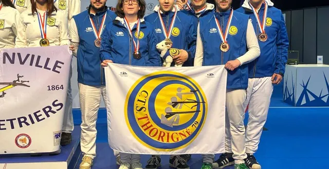 photo  clément agaut (au milieu) et le cs thorigné repartent victorieux de ces championnats de france.  &copy;  cs thorigné 