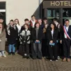 photo samedi, une partie des jeunes entourés d’élus et de leurs parents devant l’hôtel de ville, après la remise des cartes électorales.