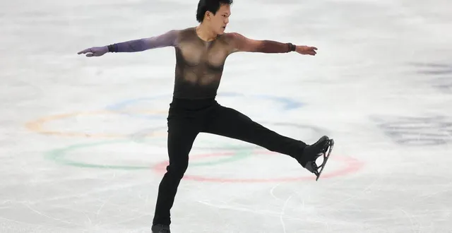 photo  adam siao him fa lors de sa performance sur le programme court de patinage artistique aux jo 2026 de milan-cortina, mardi 10 février 2026.  &copy;  jamie squire / getty images via afp 