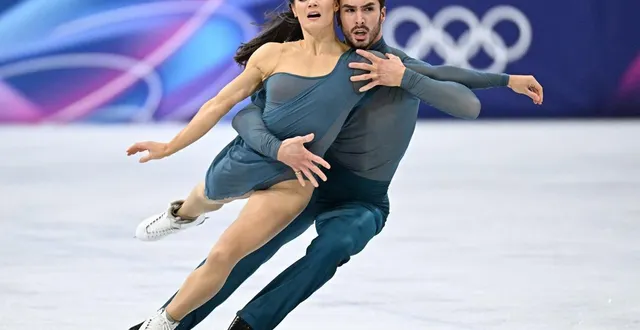 photo  laurence fournier beaudry et guillaume cizeron ont décroché l’or olympique au jo 2026 de milan-cortina.  &copy;  afp 